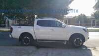 Nissan NP300 Frontier 2023 4p Platinum LE L4/2.5 Aut 2023 Nissan NP300 Frontier Ingreso Exteriores 3