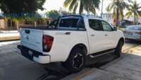 Nissan NP300 Frontier 2023 4p Platinum LE L4/2.5 Aut 2023 Nissan NP300 Frontier Ingreso Exteriores 4